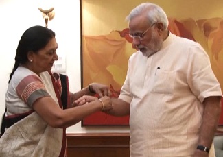 Rakhi to PM Modi by Anandiben