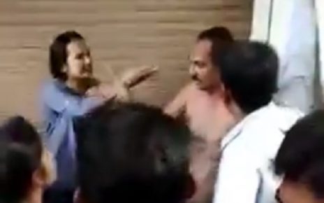 rajkot lady beating man