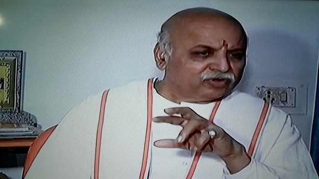 togadia to appear before ahmedabad metro court