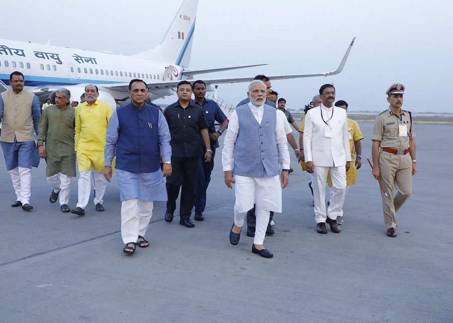 pm modi arrives in surat for run marathon