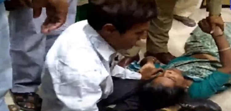 bhavnagar lady attempted self immolation arrested by police