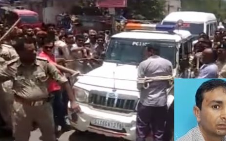 bhavnagar rapist teacher beaten by police in public