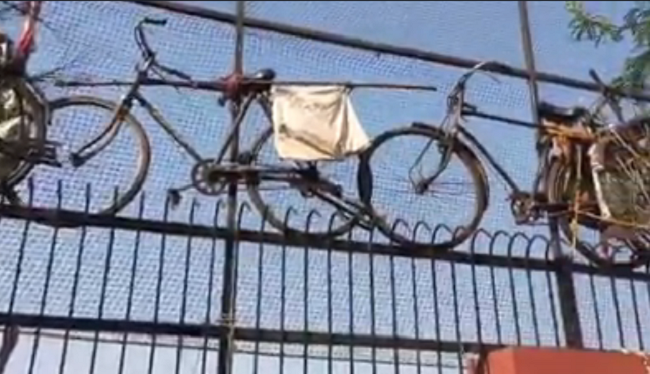 bicycles on wall of gujarat college