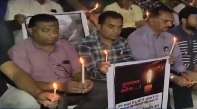 candle march protest in ahmedabad