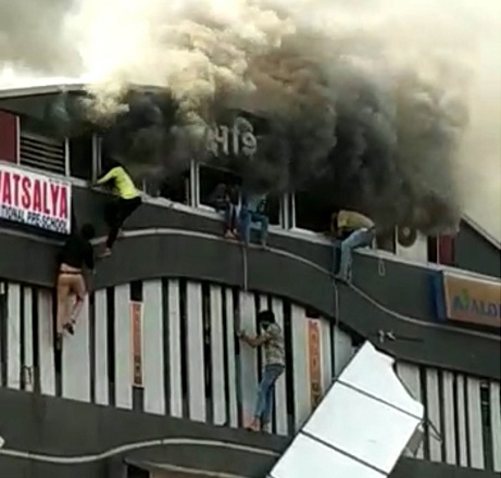 surat classes fire students jump down